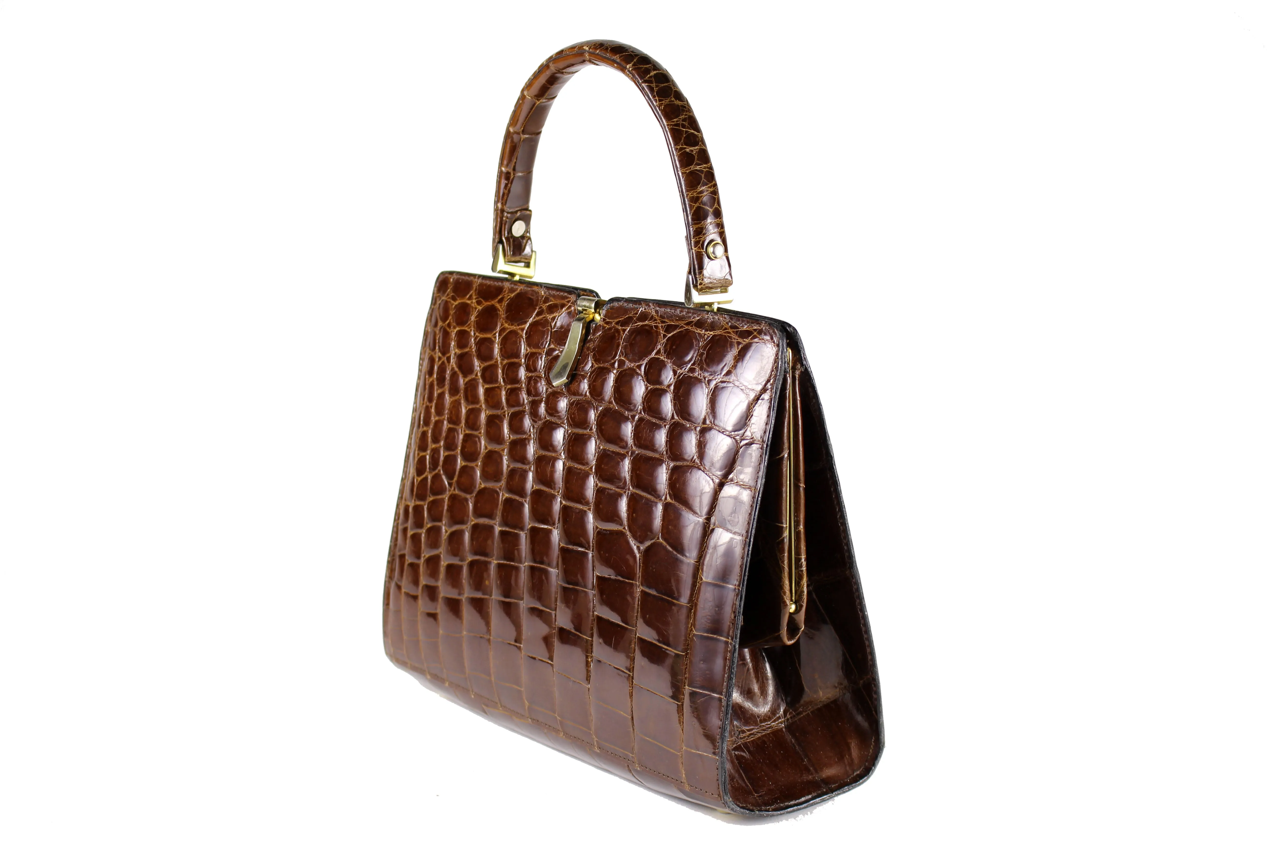 Glossy brown crocodile skin frame handbag